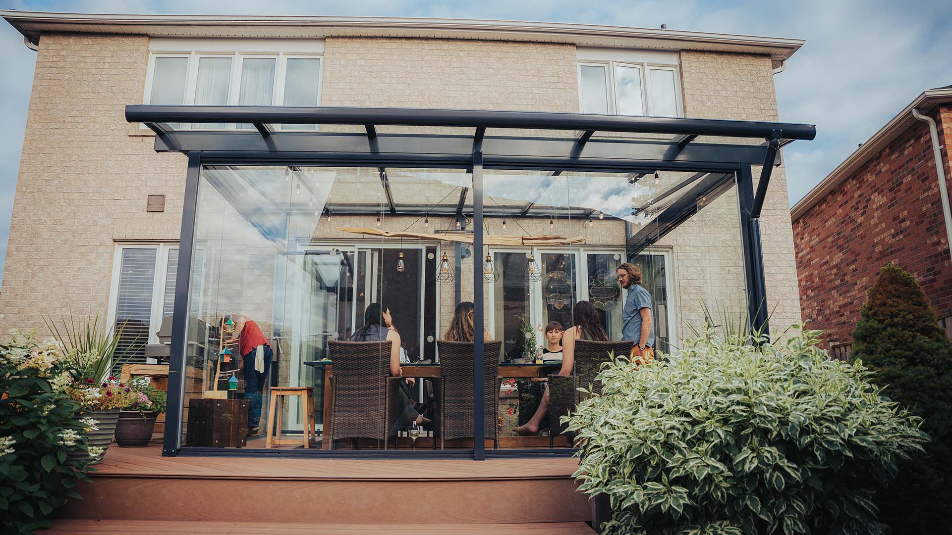 Dinner party in Lumon sunroom in Vaughan, Ontario